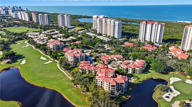 Building Photo - 7040 Pelican Bay Blvd Unit D401