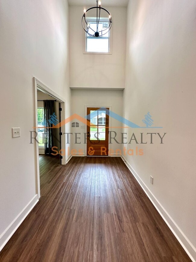 Photo - 3BR Home with Office, Bonus Room, Large Kitchen Island, 2-Car Garage & Large Yard – Huntsville Li...