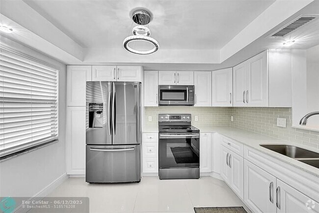 Building Photo - 3005 Portofino Isle Unit L3 Rental