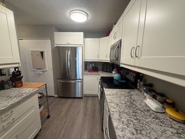 Photo - Updated Townhome Backing to Open Space in Prime Lafayette Location