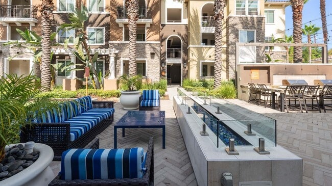 Kick back and socialize in the stylish outdoor lounge designed for comfort and connection.