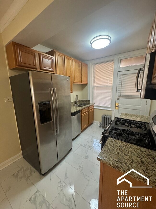 Building Photo - 6214 N Mozart St Unit 2E Rental