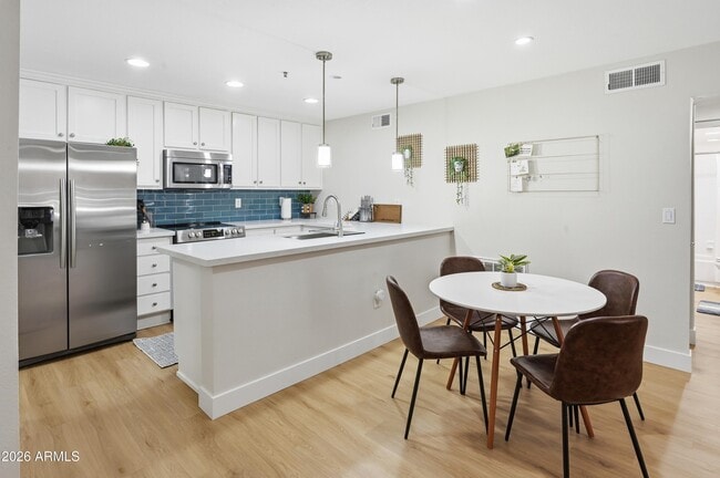 Building Photo - 4704 E Paradise Village Pkwy N Unit 228