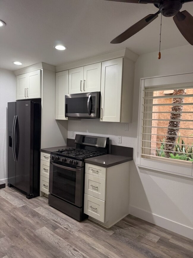 Photo - 6600 Warner Ave Unidad 119