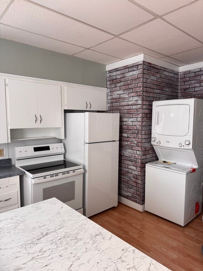 Kitchen new appliances - 102 E Main St Unit Main Street Loft