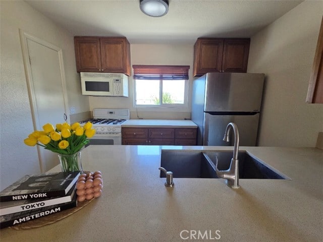 Building Photo - 15317 Santa Gertrudes Ave Unit JJ101
