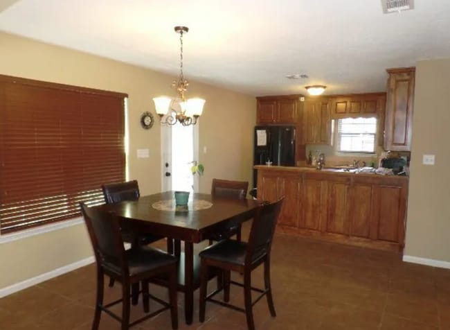 Photo - Charming 3BR Home with Open Floor Plan, Screened Porch & Covered Front Porch in Lakeland
