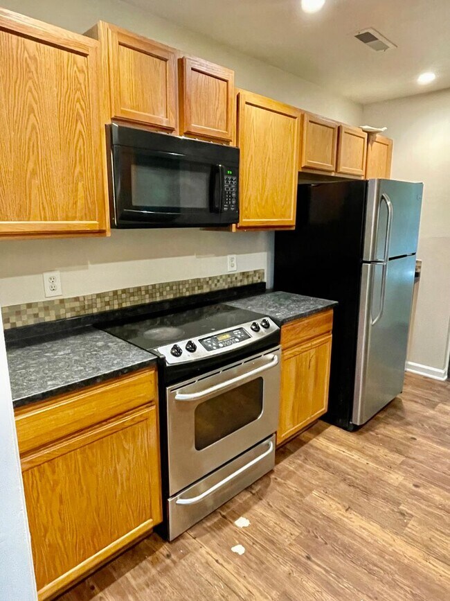 Photo - Spacious 4-bedroom, 2.5-bath home in Charlotte with convenient access to Uptown