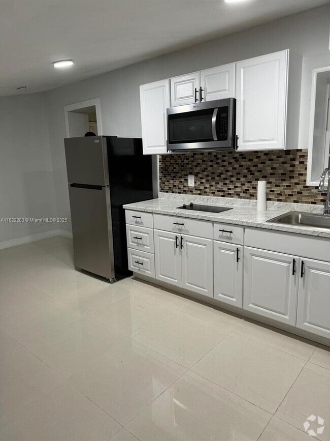 Building Photo - 620 SW 69th Terrace Unit STUDIO Rental