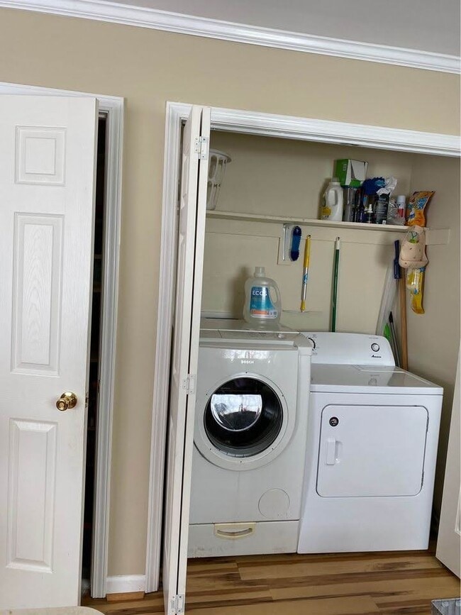 laundry area with sliding doors - 1214 Berkeley St Unit main bedroom private bath