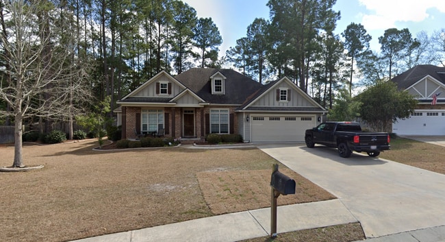 Building Photo - Experience Southern Charm 4 Bed, 3 Bath Home with Fenced Backyard