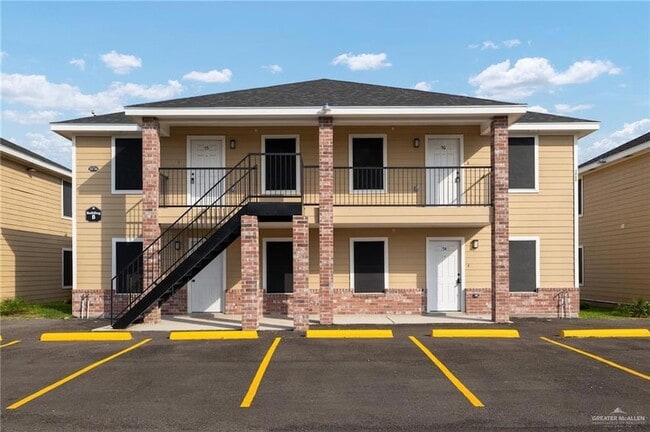 Building Photo - 1426 E Rogers Rd Unit 14