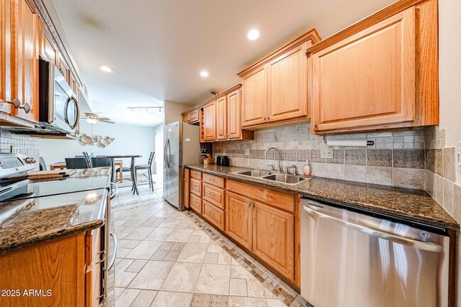 Building Photo - 10827 W Santa Fe Dr Rental