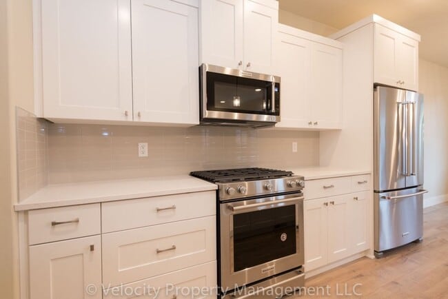 Photo - Townhome with Primary Bedroom on the Main ...