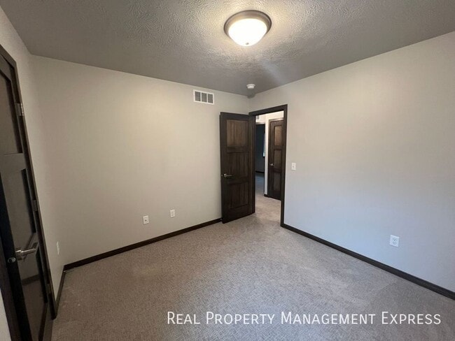 Photo - Modern Luxury: 3BR Townhome with Stylish F...