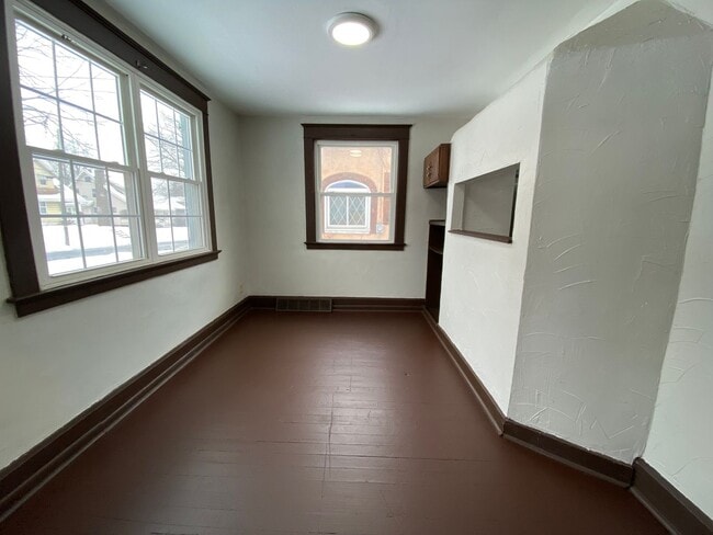 Photo - Cozy Akron Home w/ Fireplace Charm, Detached Garage & Back Porch