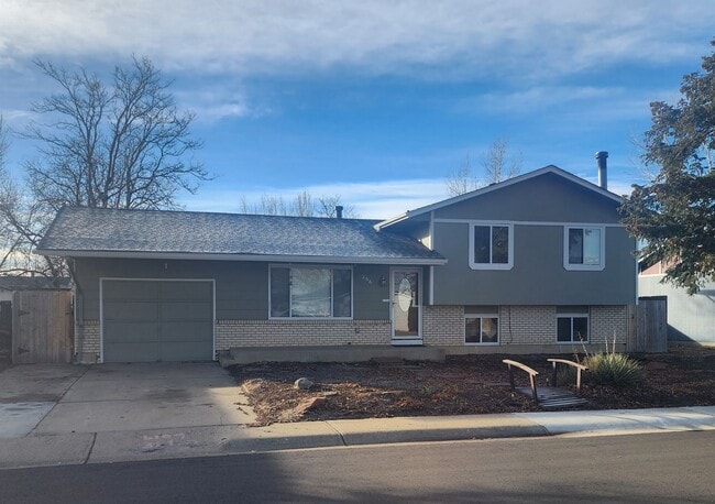 Building Photo - Shop-Ready 4BR Home with Lift-Ready Detached Garage & RV Parking Near Downtown Firestone