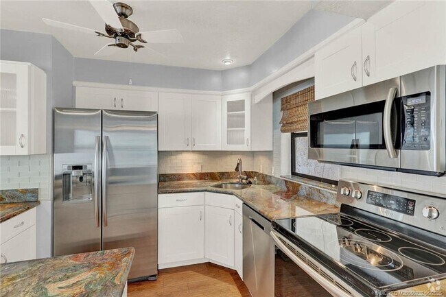 Building Photo - 1950 SW Palm City Rd Unit 1-201 Rental