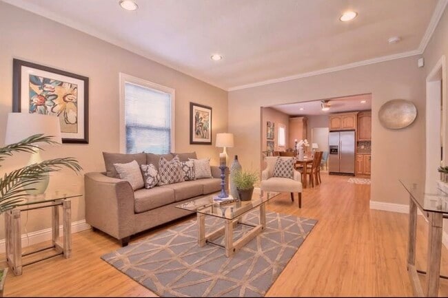 How furnished would look like. This is our living room. It is currently empty. - 1912 E St Rental