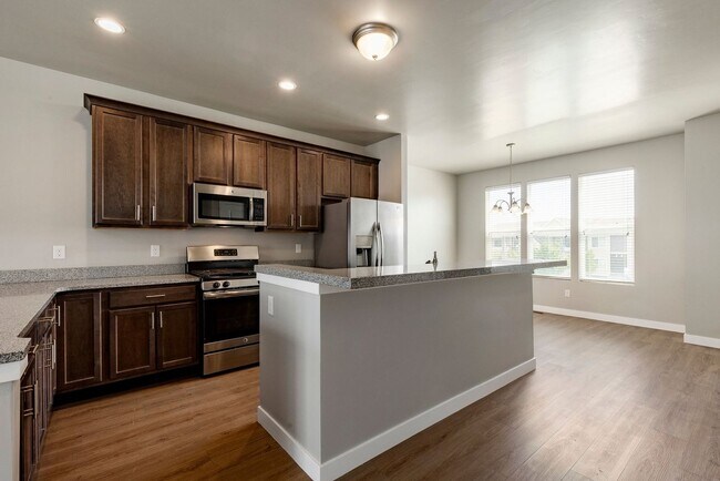 Photo - Spacious 4-Bedroom Townhome with Guest Suite, Modern Finishes & Prime Herriman Location