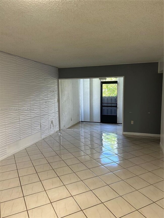 Building Photo - 9445 Fontainebleau Blvd Unit 104-104 Rental