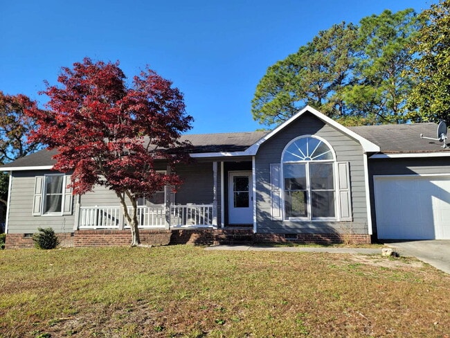 Building Photo - "Charming 4-Bedroom Fayetteville Retreat with Cozy Fireplace"
