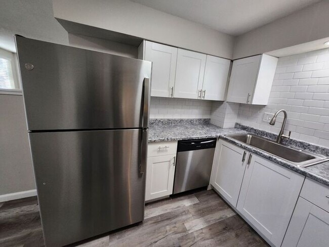 Photo - 2-Bedroom Townhome with Fenced Backyard and Modern Updates!