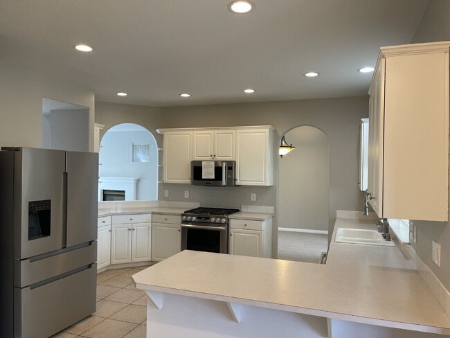 Photo - 4-Bedroom Happy Valley Home with Large Garage, Spacious Living Areas & Covered Deck