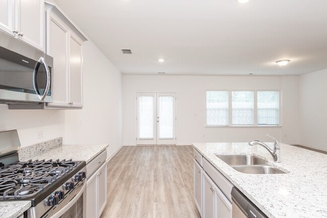 Photo - Beautifully designed 3-bedroom, 2.5-bath end-unit townhome in Suwanee