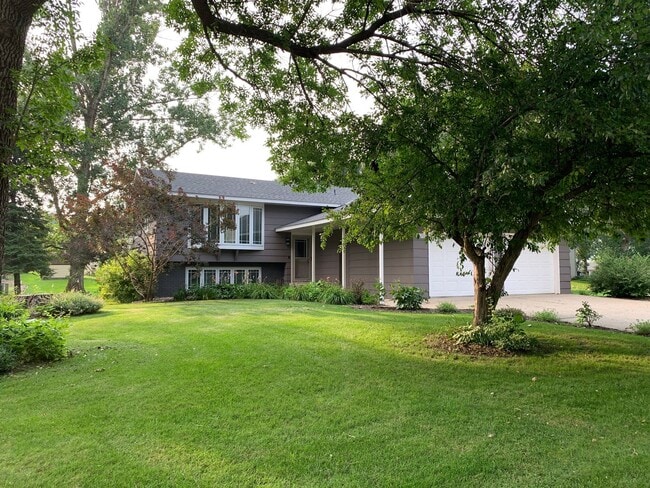 Beautifully Landscaped Split-Level Home - Beautifully Landscaped Split-Level Home
