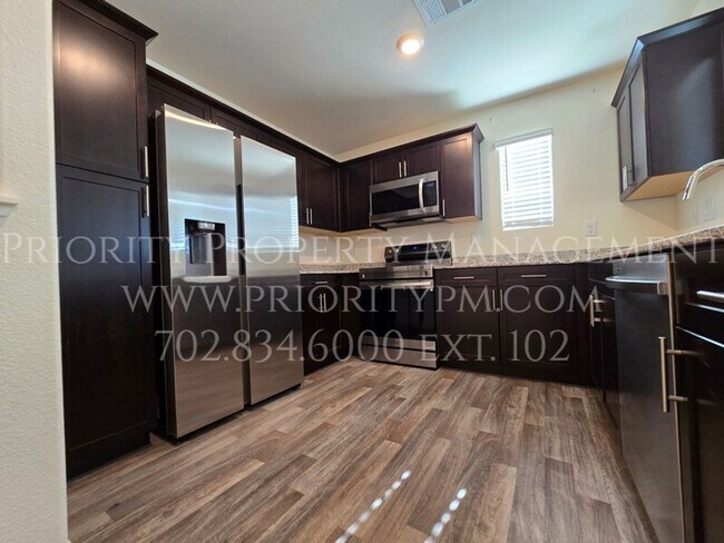 Photo - Gated~ 2 Bedroom Townhome w/2 Car Garage~MUST SEE!