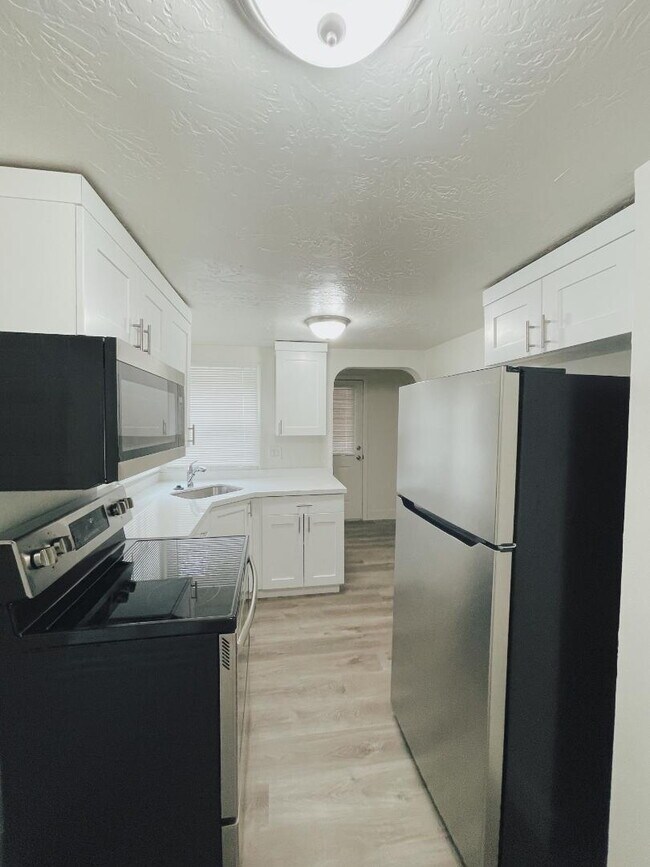 Photo - Available Now — 1 BR / 1 BA Creekside Duplex Unit in Millcreek — $1,200/mo