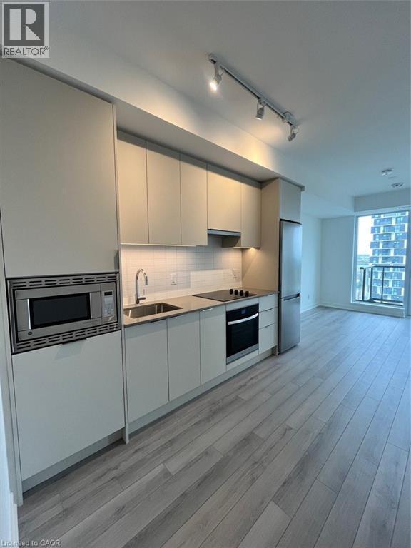 Photo - 3079 Trafalgar Rd Unité 1406