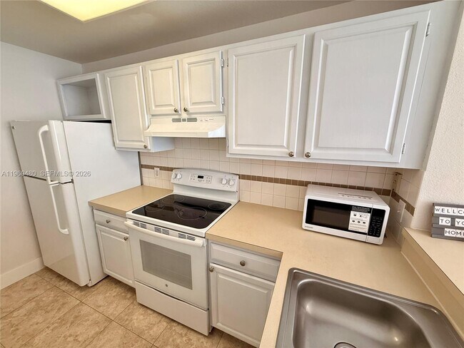 Photo - 1845 Palm Cove Blvd Unit 8-208