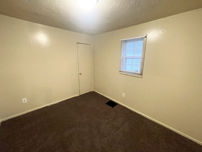 Photo - 2 Bedroom Home with gravel driveway for off-street parking