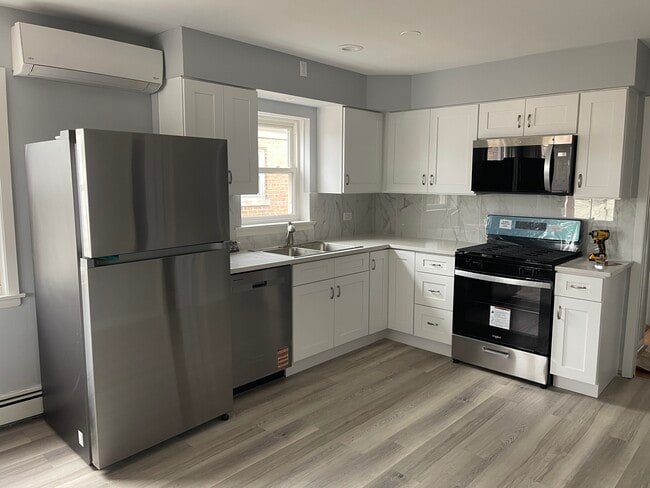Building Photo - 2909 N Austin Ave Unit 2