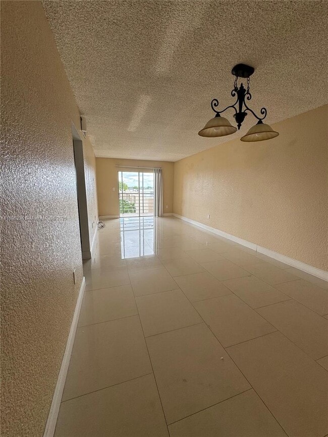 Photo - 6095 W 19th Ave Unit 407