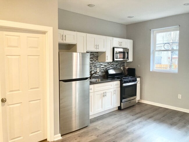 Photo - Move-In Ready 3BR Townhome Near Parks, Cafés & Transit