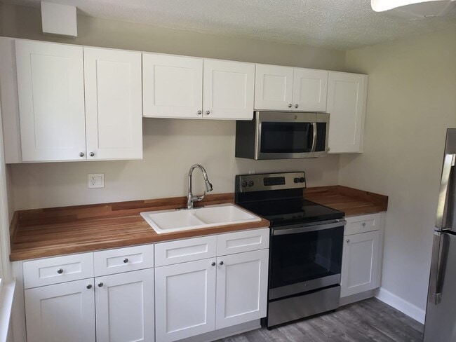 Photo - NEWLY RENOVATED DUPLEX UNIT Unit 12 Country Squire Court B