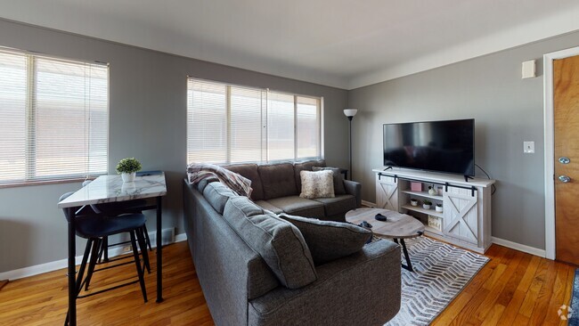 Imagine your furnishings in the Bright Living Room - 118-120 N Center St-Walk to Everything V-Tour Rental