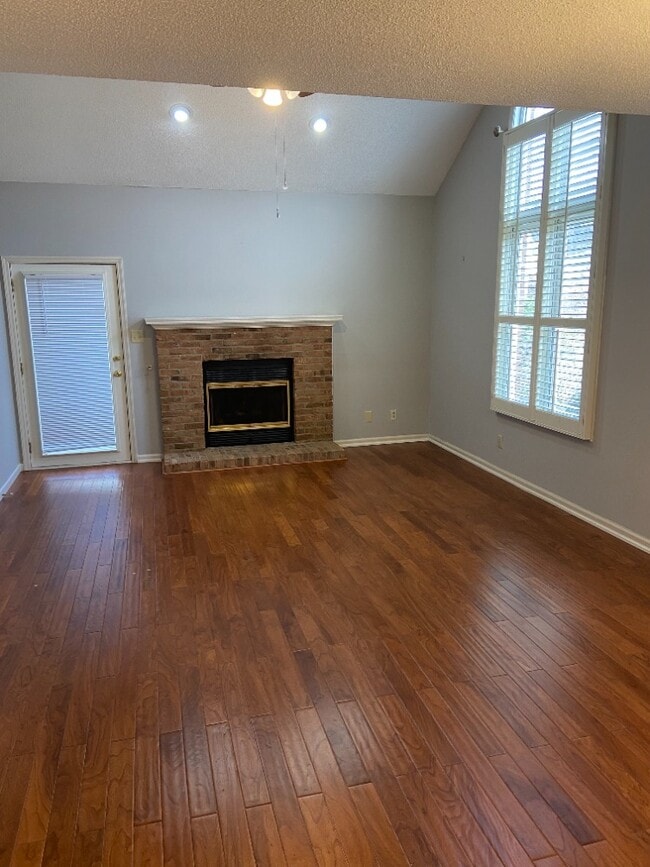 Living room with back door - 10401 Ravenbrook Ln Unit 10401