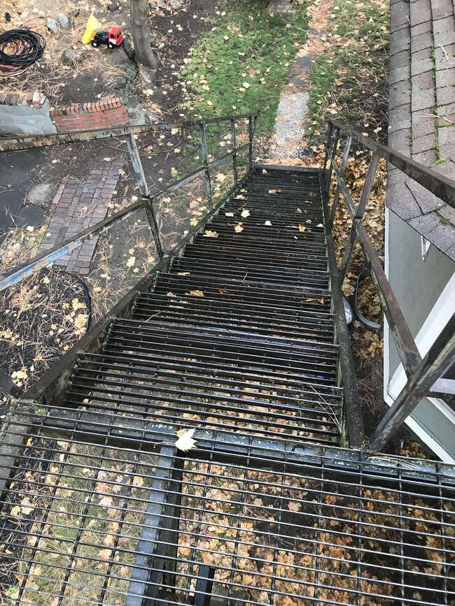 Iron staircase entry - 1817 W 8th Ave Townhome