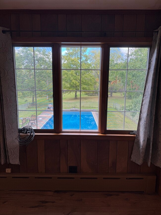 View of backyard thru large window - 6414 State Route 233 Unit Studio-C