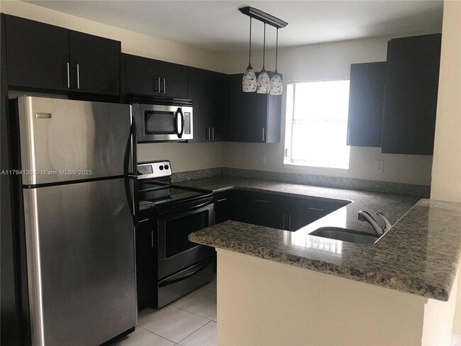 Photo - 4088 N Pine Island Rd Condo Unit 400