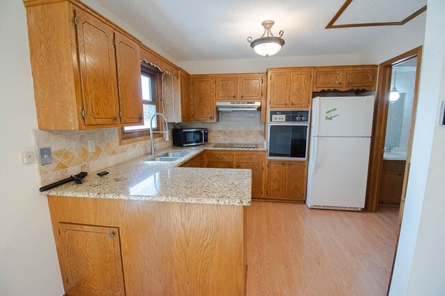 Photo - Spacious 2 Bed, 1.5 Bath with Oversized Garage!
