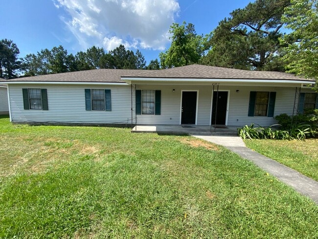 Building Photo - 6107 Vinnie Dr Unit A