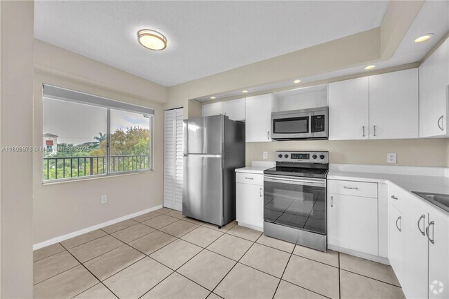 Building Photo - 12551 SW 16th Ct Unit 403C Rental