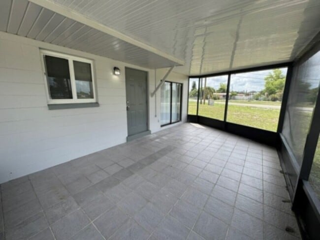 Photo - New Kitchen, Fresh Paint and a Large Screen in Lanai!