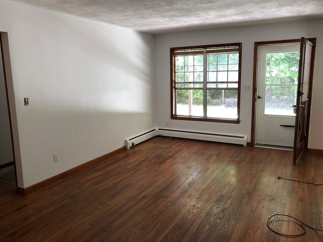 Living room windows/front door - 1 Colonial Rd Unit 123