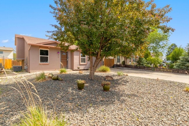 Photo - Updated 4-Bedroom Home with Central A/C & Xeriscaped Yard